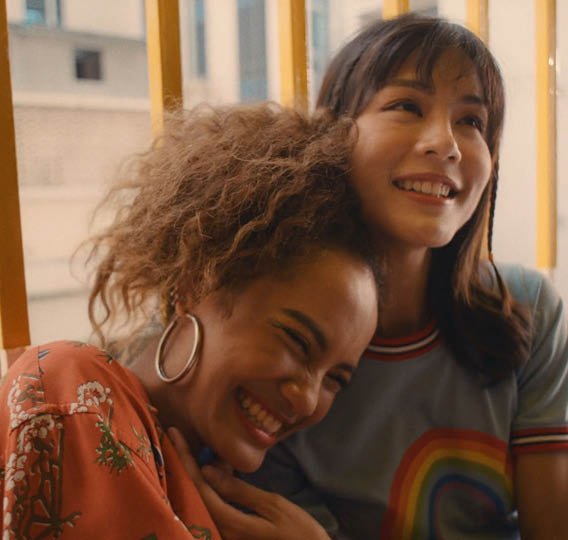 Two women hugging each other. Description generated by AI